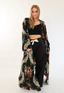 Full length silk Liberty of London couture robe open showing Saint Liberté black pyjama pants and Saint Liberté black bralette